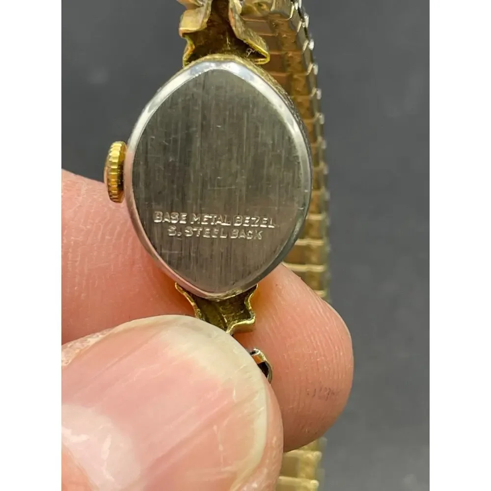 Vintage Timex Watch Women's Gold Tone Round Stretch Band Manual Wind Up 16mm